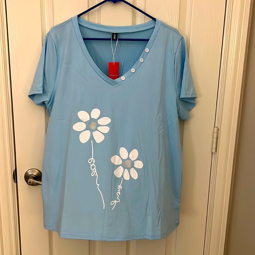 New with tags, woman’s shirt.